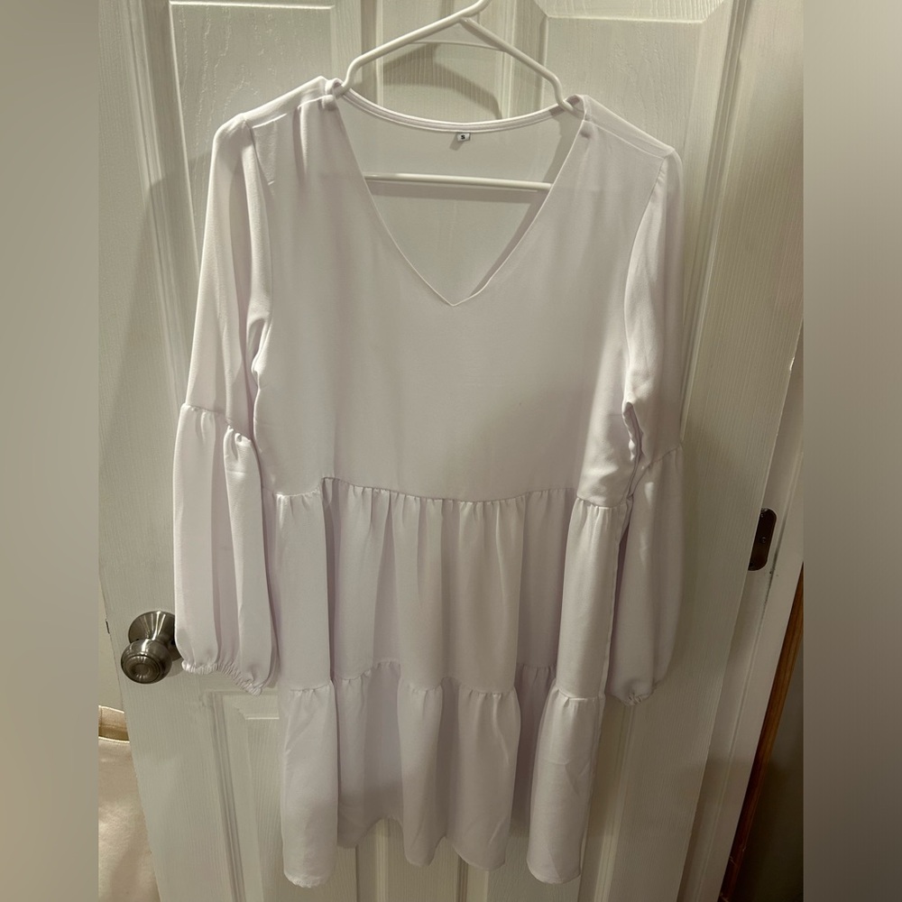 Amazon. Women’s small, long sleeve white midi-dress.